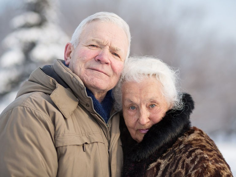 Mature couple laughing